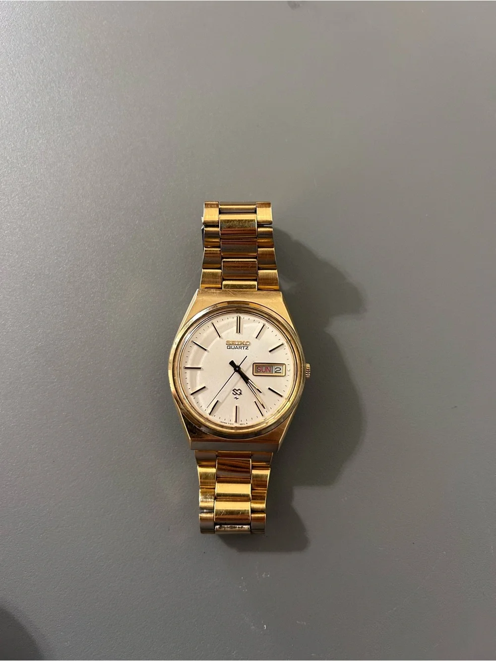 Seiko Quartz Day/Date Gold Tone Metal Bracelet Silver Dial 33mm Men’s Watch